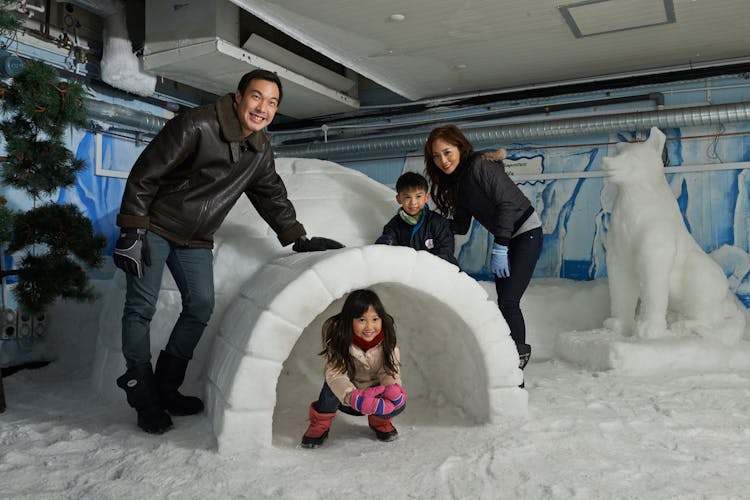 A woman inside an Igloo