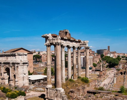Roman Forum ruins with ancient columns on a small group tour in Rome, Italy.