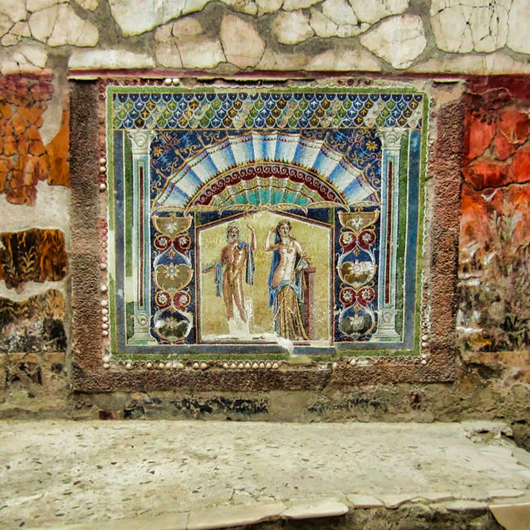 Ancient fresco in Herculaneum depicting mythological figures, Italy.