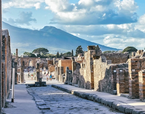Ancient ruins of Pompeii with Mount Vesuvius in the background, Italy.